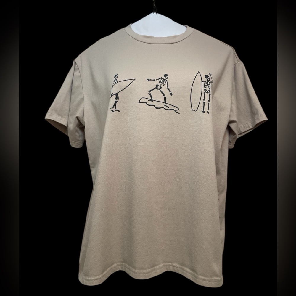 Women’s size small khaki colored shirt. Surfer skeleton dudes